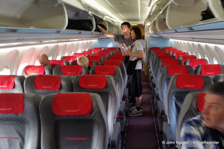 The economy cabin of an Austrian Airlines Fokker 100.