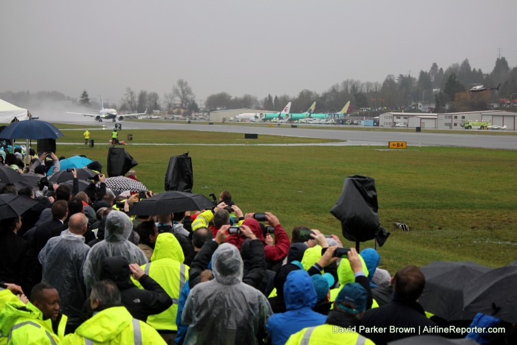 Several thousand Boeing employees and media braved the rain to witness the first flight of the 737-MAX