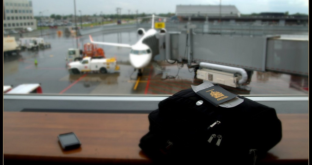 Getting ready to fly -- passport ready - Photo: Caribb | FlickrCC