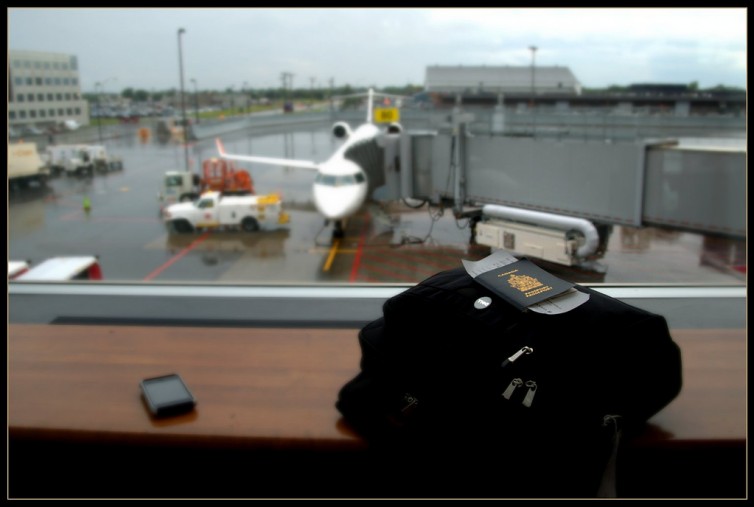 Getting ready to fly -- passport ready - Photo: Caribb | FlickrCC