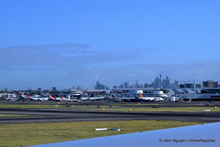 Arriving at Sydney Airport, with the Sydney skyline in the background.