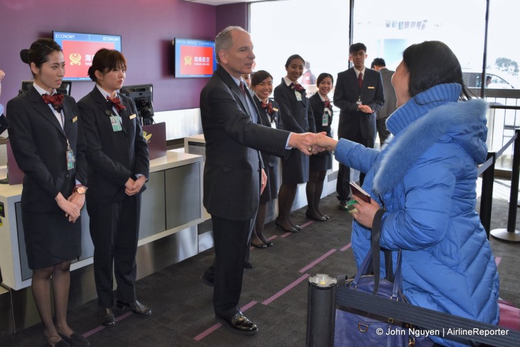 Joel Chusid, Executive Director for Hainan's USA operations, welcomes the first passenger to check in for inaugural flight HU7924 from LAX to Changsha on January 21.