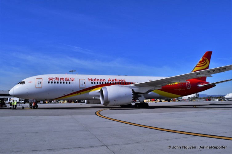 A Hainan Boeing 787-8 (B-2739), operating inaugural flight HU7923, approaches Gate 22 at LAX.