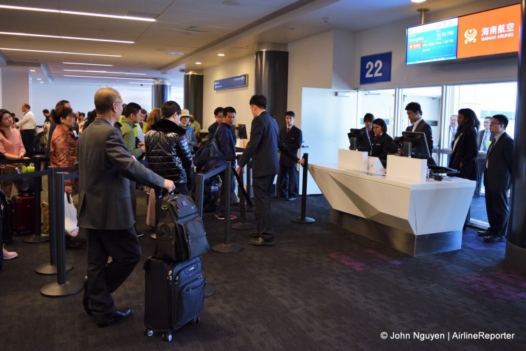 Passengers waiting to board Hainan flight HU7924 from LAX to Changsha on January 21. Note the separate lane for business class passengers.