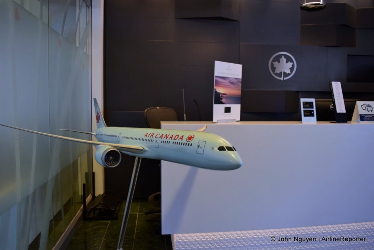 The reception desk inside the Air Canada Maple Leaf Lounge in LAX Terminal 2.