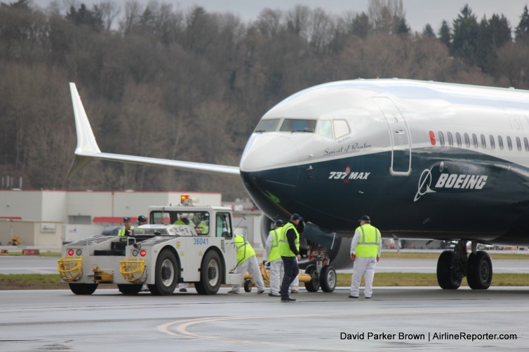 The 737 MAX being towed into place