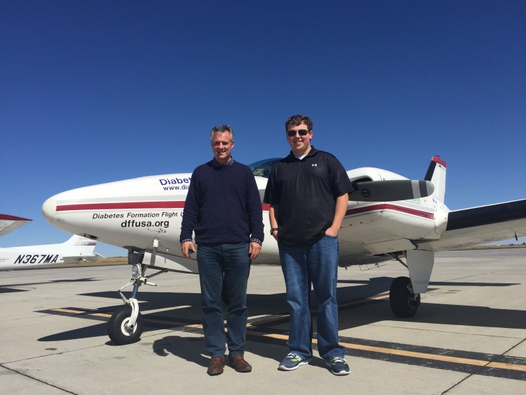 Jay and friend, Douglas Cairns, with his Beechcraft Baron (N30TB, that he flew solo around the world with T1D) after a successful leg in DFFUSA.