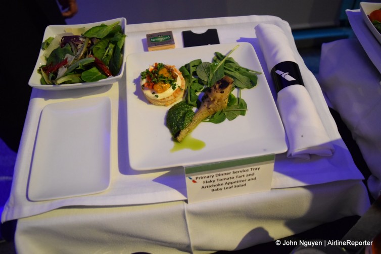 Western dinner placesetting and appetizer: Flaky Tomato Tart and Artichoke Appetizer with Baby Leaf Salad