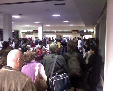 Passengers at LAX's International Terminal waiting to board, circa 2009. Photo: John Nguyen | AirlineReporter