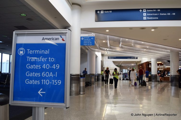 New signs at LAX Terminal 6 direct passengers to the new shuttle stop.