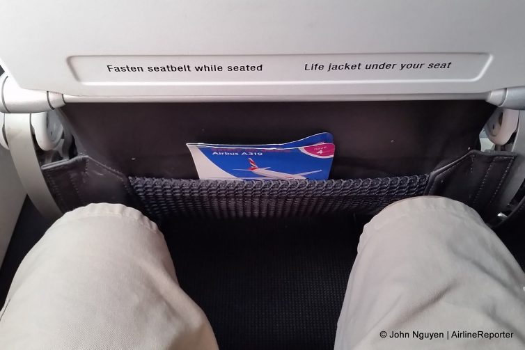 Legroom on board a British Airways Airbus A319 in economy with 29" pitch slimline seats.