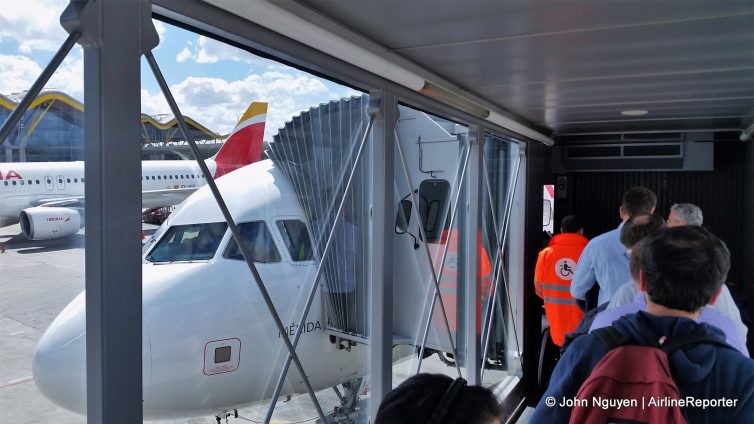 Boarding an Iberia Airbus A320 to Brussels at Madrid-Barajas Airport.