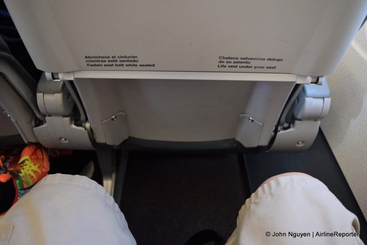 Legroom on board an Iberia Airbus A320 in economy with 31" pitch slimline seats.