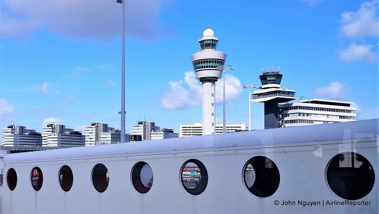 The tower and unique porthole windows on the jetbridges at Amsterdam Schiphol