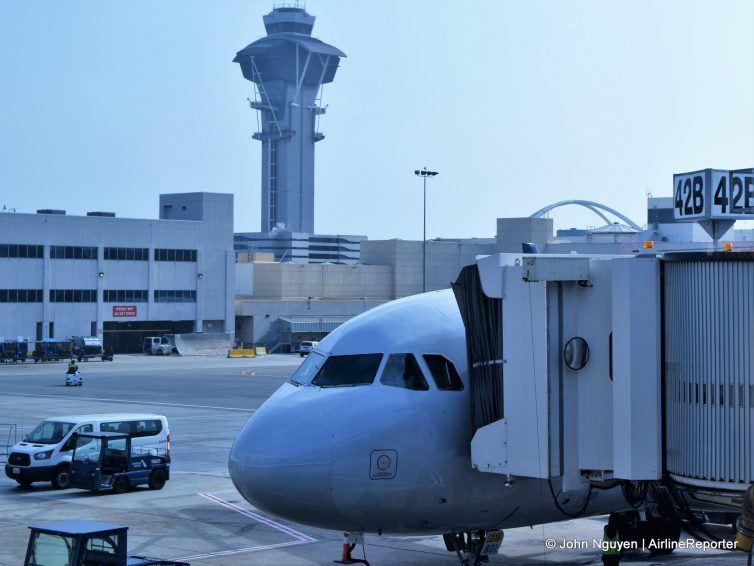 An American Airbus A319 (N801AW) at Gate 42B at LAX.