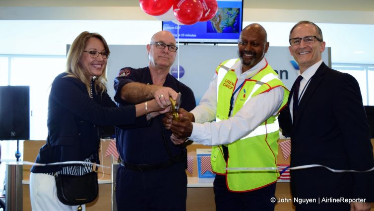 Some long-time American Airlines employees cut the ribbon for the inaugural flight to Minneapolis-St. Paul on June 2.