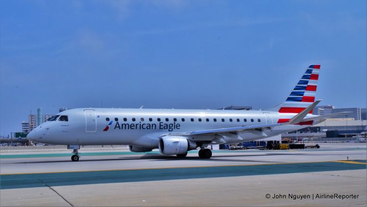 An American Eagle Embraer E-175 (N207AN, operated by Compass) taxis at LAX.