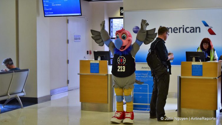 Chuck the Condor gets ready for his tumbling routine in the Eagle's Nest at LAX.