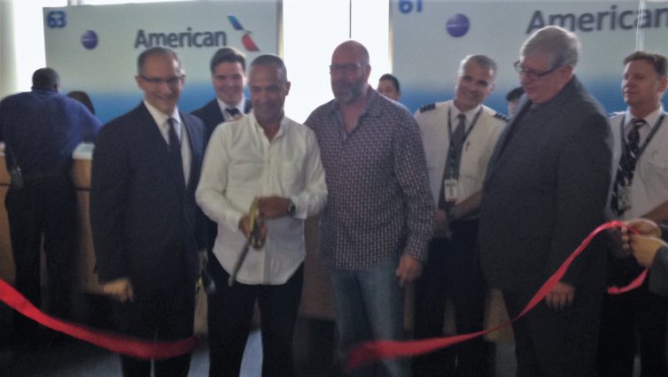 A Concierge Key passenger is invited to cut the ribbon for American's inaugural flight from LAX to Kansas City on June 2.