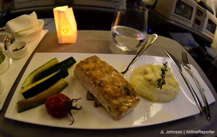 Main course: Salmon, garlic potatoes, grilled zucchini and a roasted cherry tomato. 