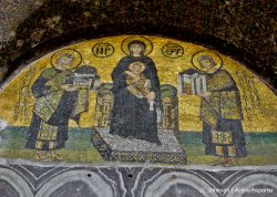 Inside the Hagia Sophia. Emperor Constantine holds a model of the city (right) while Emperor Justinian holds a model of Hagia Sophia. Both present to Virgin Mary holding Jesus.