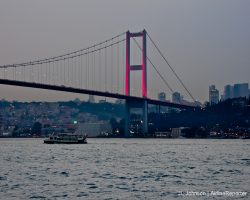 Bosphorus Bridge seen from the Asian Side, lit in pink to promote awareness of 'women cancers.'