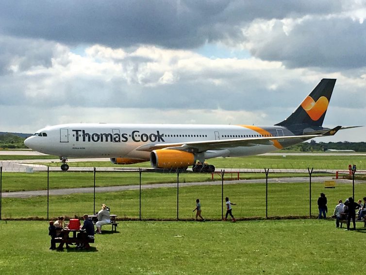 A Thomas Cook Airbus A330 taxis by the Manchester Airport Runway Visitor Park (Credit: Jason Rabinowitz)