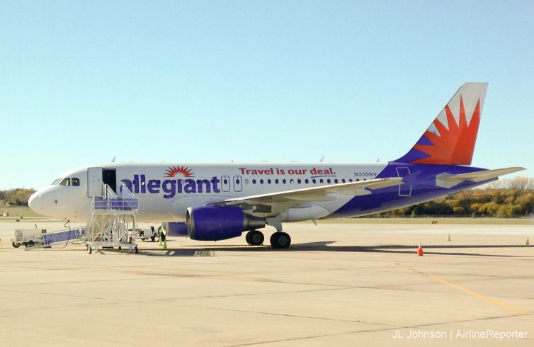 An A319 inaugurates MHK-AZA service shortly after Allegiant began operating the type. This plane presumably pulled from the paint shop premature. - Photo: JL Johnson