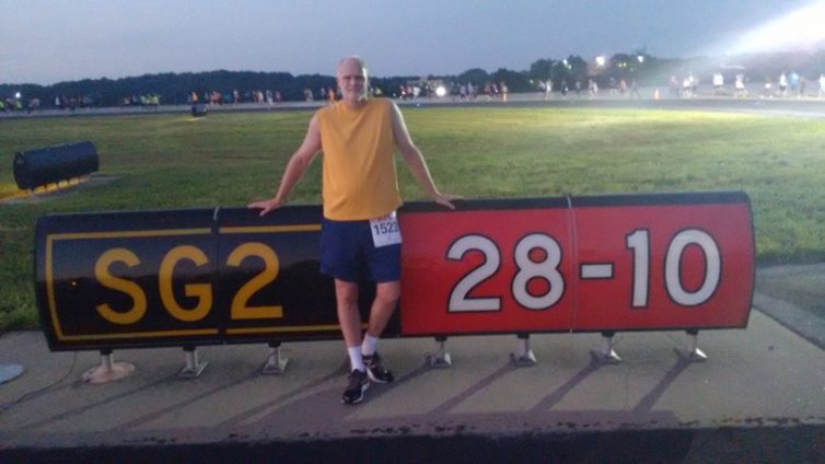One of the great photo ops during the race, standing against the taxiway sign marking the entrance to runway 28-10 - Photo: John Huston