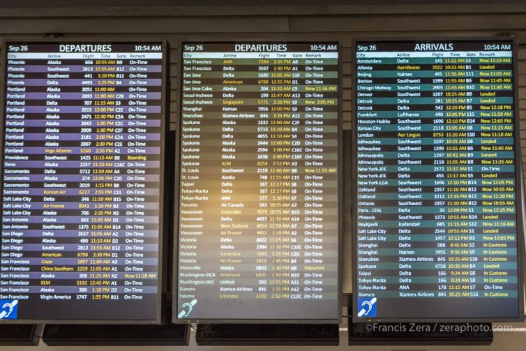 A Sea-Tac departures board shows the new flight.