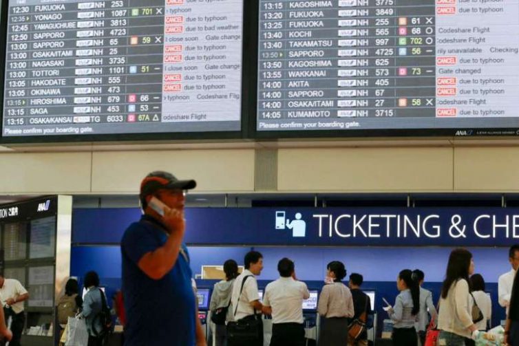 Apparently typhoons and airplanes don't get along ’“ Photo: EPA