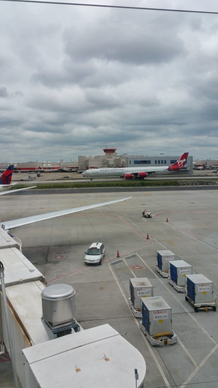 Bubbles the A340 has arrived. This is the plane taxiing to its gate as viewed from the Sky Club in Terminal F, ATL - Photo: Jonathan Trent-Carlson