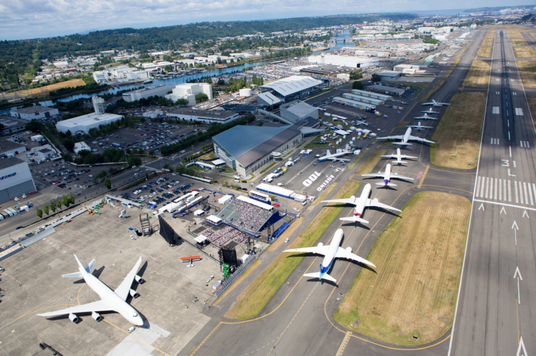 Boeing jetliners, from its first 707 to the latest 787 Dreamliner, line up along a Boeing Field taxiway in Seattle, WA on July 15, 2016 to celebrate the company"s 100th anniversary - Photo: Jeremy Dwyer-Lindgren