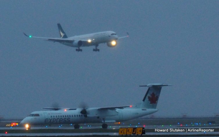 From over a mile away, this was the best I could get of the CX A350 landing on YVR's north runway.