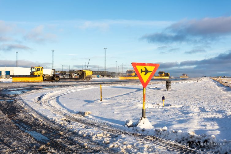 A convoy of snowplows returns from clearing KEF's runways and taxiways.