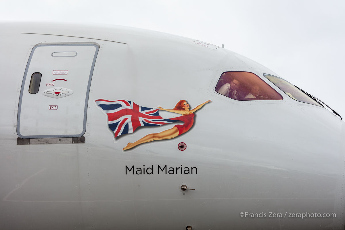 The flight crew works to secure the aircraft after the flight.
