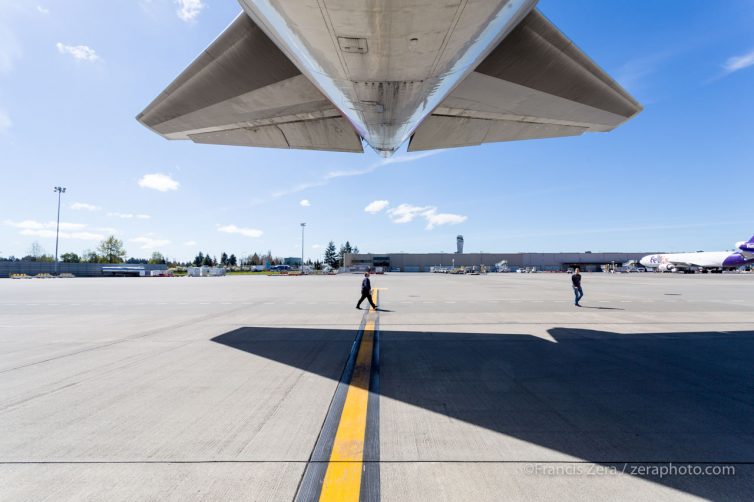 Pruitt (right) does a pre-flight walkaround of the aircraft.