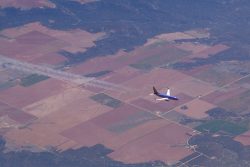 Traffic passing below, over New Mexico - photo: Daniel T Jones | AirlineReporter