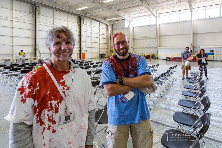 Volunteer "victims" hung out in a comfortable hangar, waiting for the drill to begin.