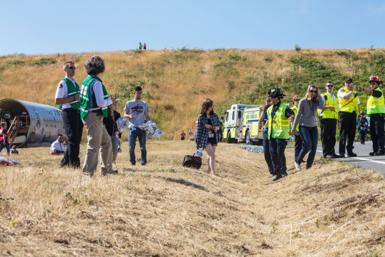 Several "victims" were coached to drag their luggage with them, while others were asked to hang around the fuselage taking selfies to provide rescuers the opportunity to work around a couple of trending hazards.