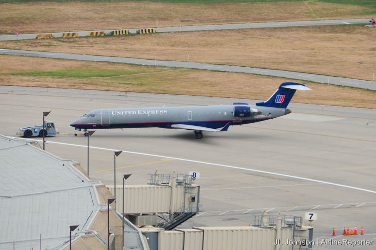 Save the tulip! A Saul Bass liveried express jet pushes back from terminal A in August, 2012.