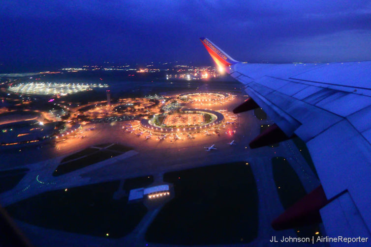 Kansas City International seen from a departing flight in June of 2015. The partially unlit terminal A is to the far left.