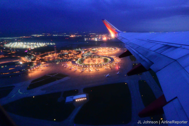 Kansas City International seen from a departing flight in June of 2015. The partially unlit terminal A is to the far left. 