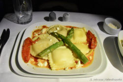 Main Course: Mascarpone sun-dried tomato ravioli and wild mushroom ravioli with toasted pine nuts and feta cheese.