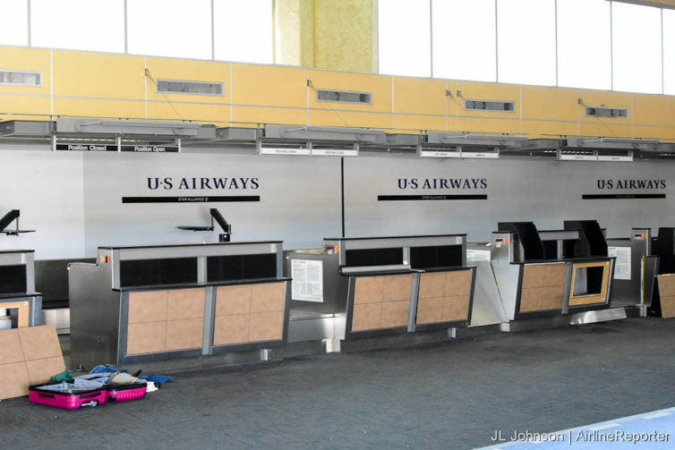 US Airways ticketing desks, still housing US card-stock.