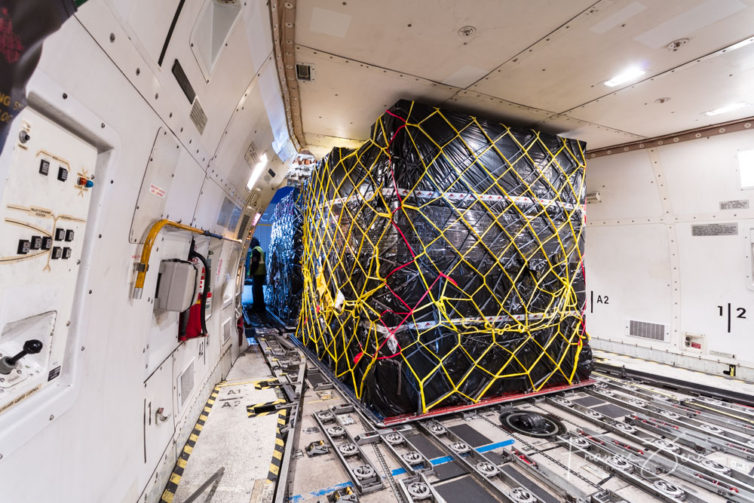 Cargo is organized onto pallets, which are moved into position inside the plane on an ingenious system of motorized rollers. Once in position, the pallets are locked into place.