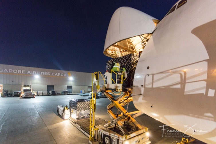 The 747-400F's hinged nose allows large pallets to be loaded quickly.