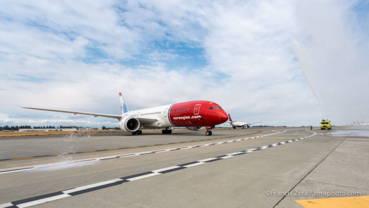 The jet was welcomed to Seattle with a traditional water-cannon salute.