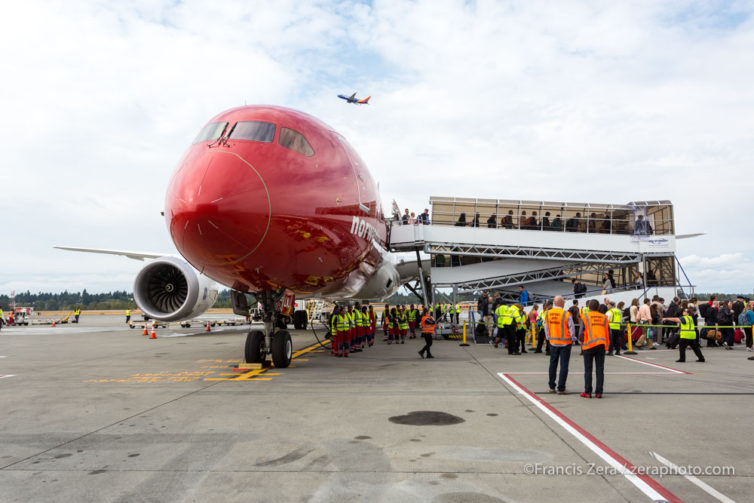 Passengers deplane via one of the airport's new all-weather airstairs.