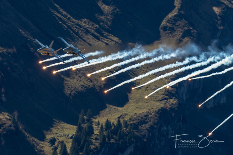 At precisely 2 p.m. (this is Switzerland after all), a pair of F/A-18s rocketed up the valley spitting flares, signifying that the demo had begun.